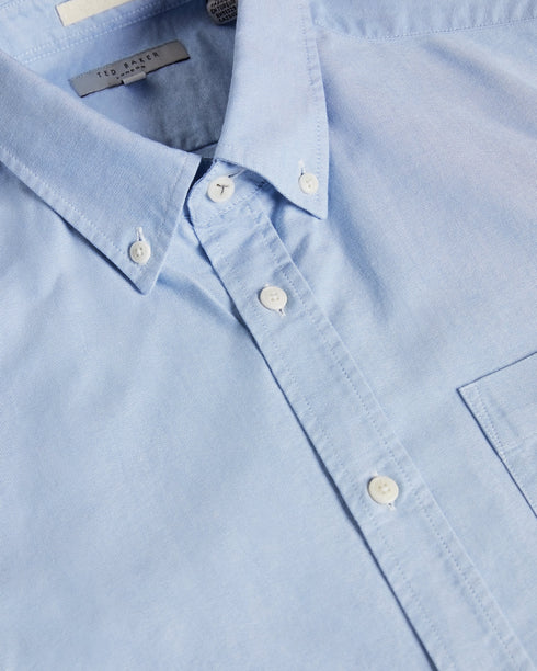 CAPSHO-Shirts-This summer classic is ready to enter your regular rotation. CAPSHO is crafted from a blend of cotton and lyocell — ideal for staying cool in the warmer months. The button-down collar and embroidery detail mean this oxford shirt is smart enough for work, too. By choosing Ted Baker cotton products, you're supporting our investment in the Better Cotton Initiative's mission. This product is sourced via a system of mass balance, and therefore may not contain Better Cotton. Ted Baker menswear col